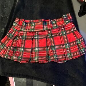 Pleated plaid mini skirt
